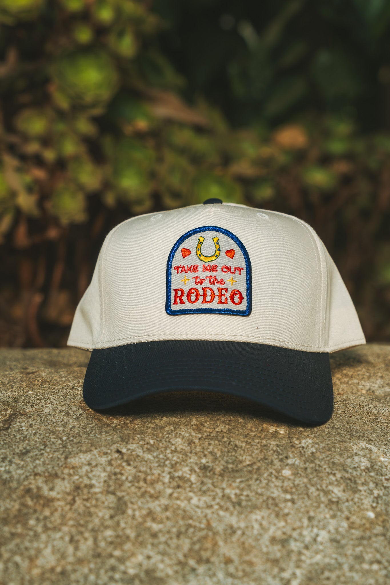 Take Me Out To The Rodeo (Navy/Natural Trucker Cap)