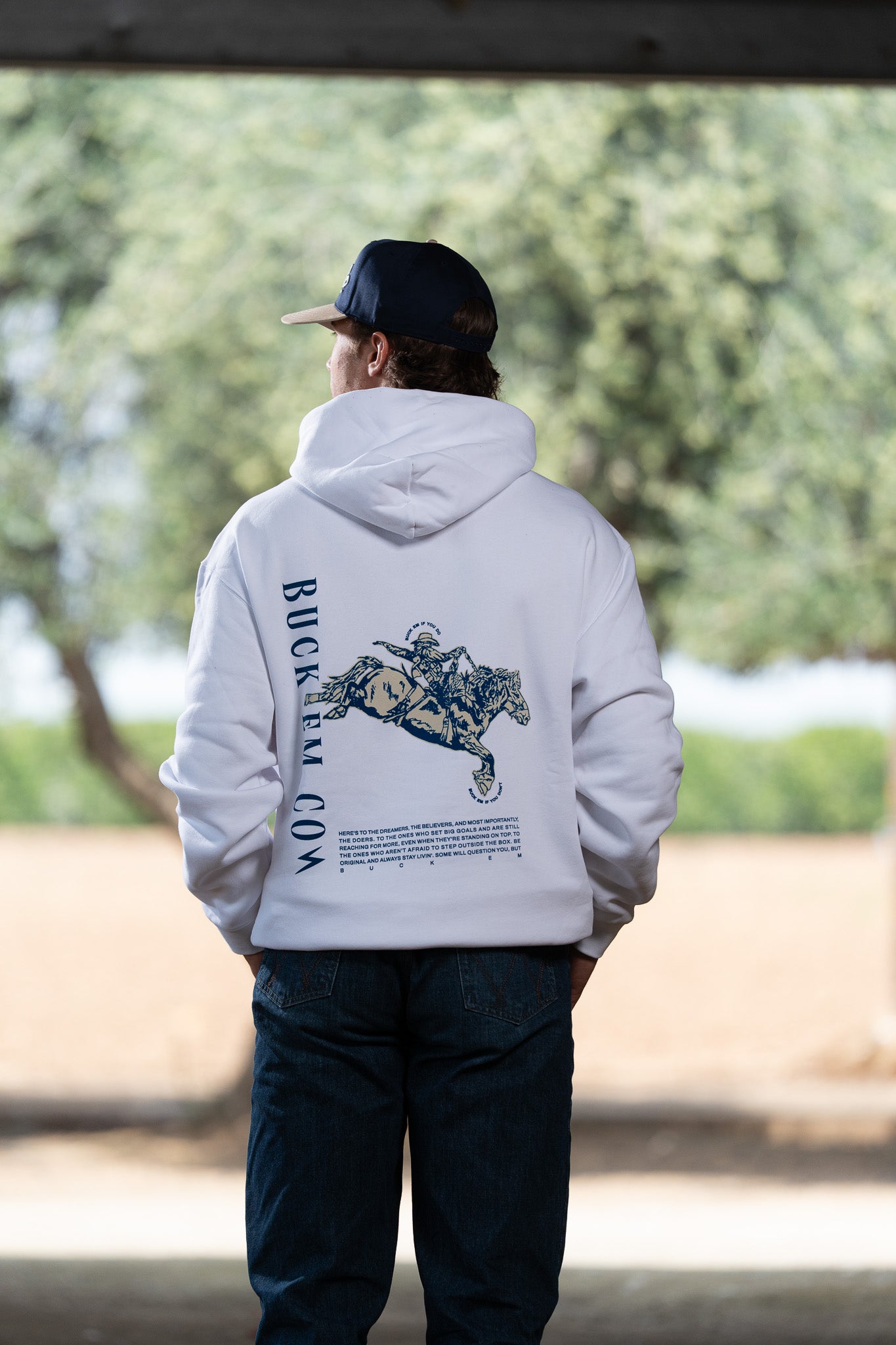 BUCK EM BRONC (WHITE HOODIE)
