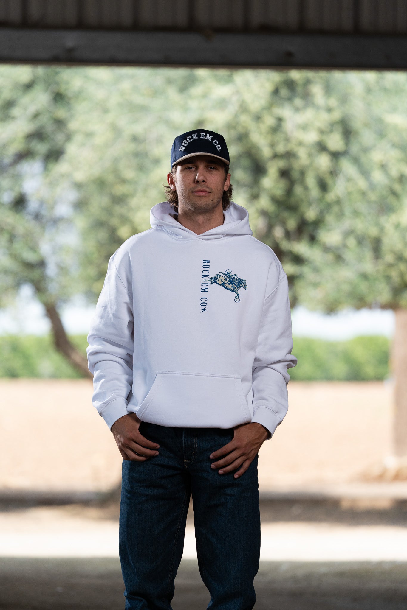 BUCK EM BRONC (WHITE HOODIE)