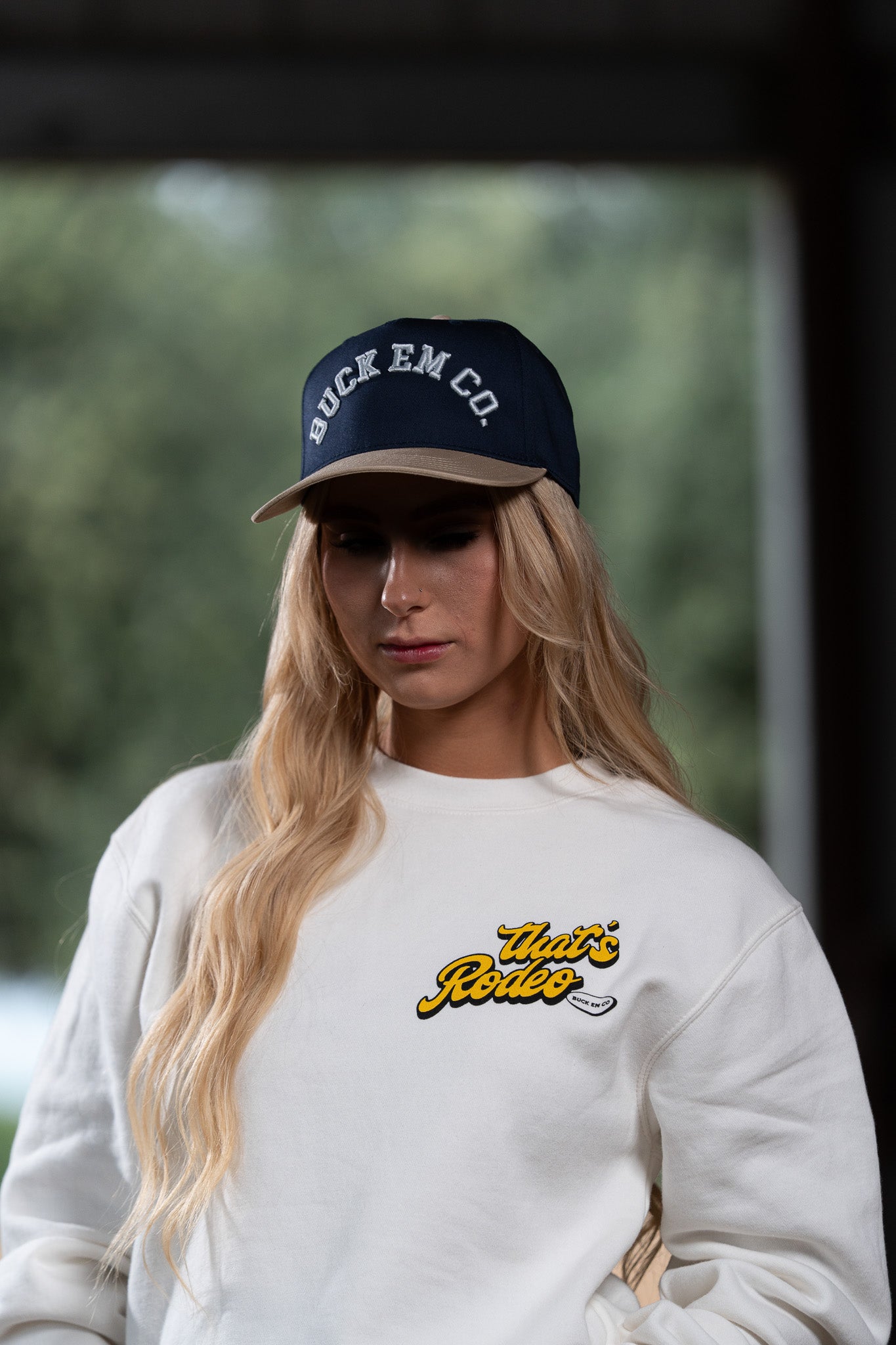 BUCK EM VARSITY CAP (Navy w/ Silver Embroidery)