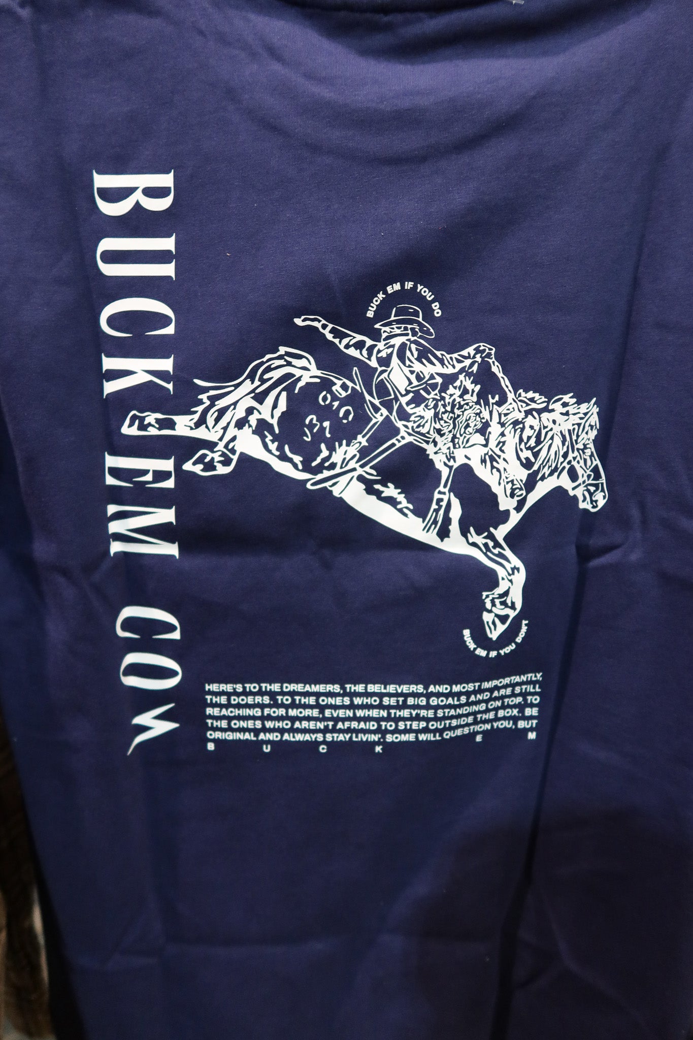 Buck Em Bronc Tee (Recommend Sizing Up)